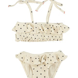 Girl ecru bikini with black hearts and ruffles