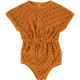 playsuit | camel w/ black hearts allover