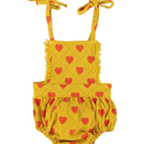 Baby playsuit | mustard w/ red hearts allover