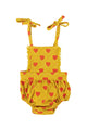 Baby playsuit | mustard w/ red hearts allover