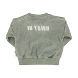 Unisex baby washed green terry sweatshirt with “best friend” print