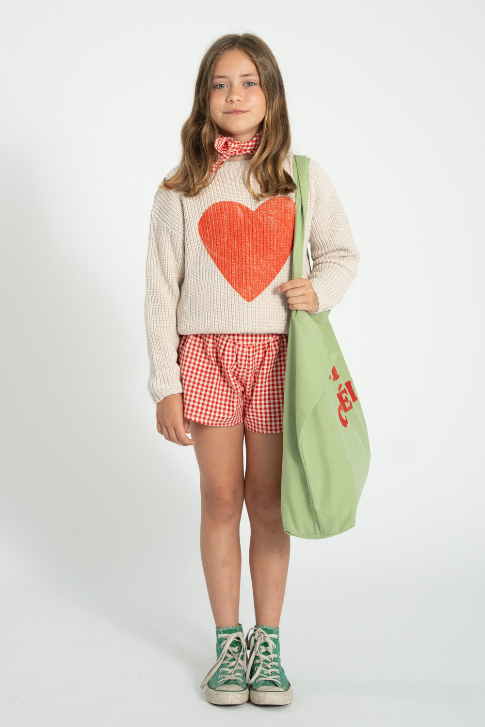 Unisex ecru knitted sweater with red heart