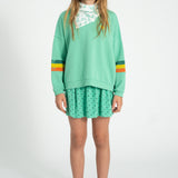 short skirt | green w/ black hearts allover