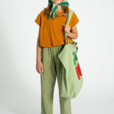sleeveless top w/collar | camel w/ black hearts allover