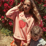 Girl light pink sweatshirt with strawberry print