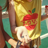 sleeveless top | mustard w/ apple print