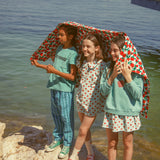 Unisex turquoise sweatshirt with “peace” print
