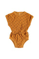 baby playsuit | camel w/ black hearts allover