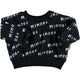 Baby sweatshirt. Black with "mimosa" allover print